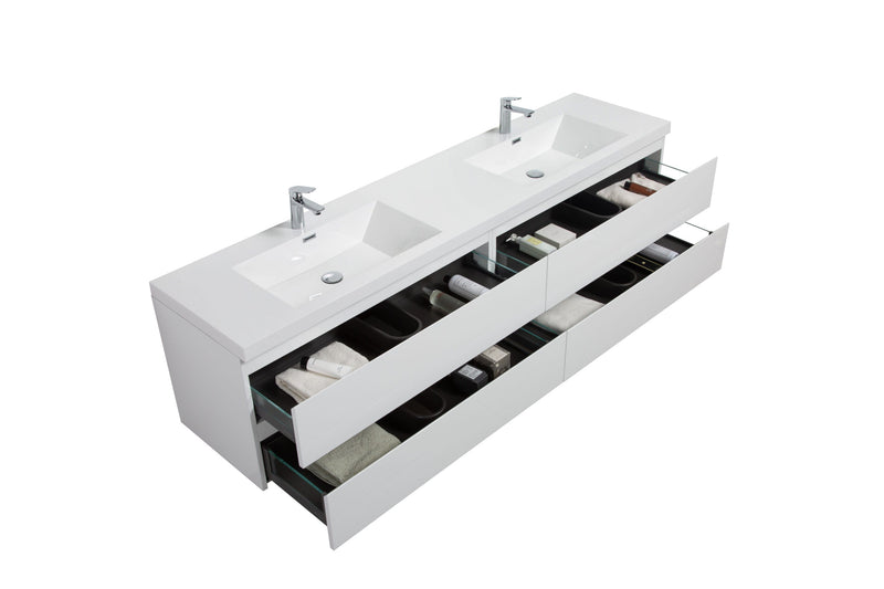 White double sink bathroom vanity with open drawers.