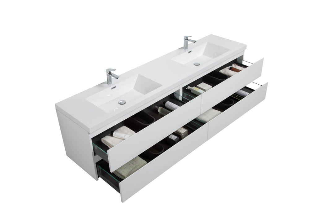 White double sink bathroom vanity with open drawers.