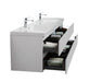 Modern double sink vanity with open drawers.