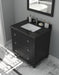 A black vanity with marble countertop, a white sink, and a mirror above it.