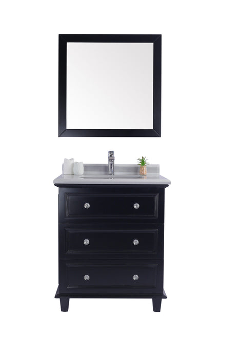 Black vanity with white marble countertop and matching mirror.