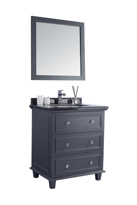 Gray bathroom vanity with mirror and three drawers.