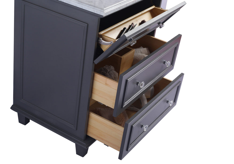 Bathroom vanity with gray cabinets, marble top, and three drawers open.