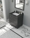 Gray bathroom vanity with a dark countertop and white sink.