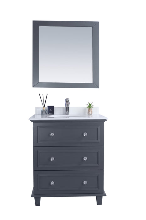 Gray vanity with white countertop and square mirror.
