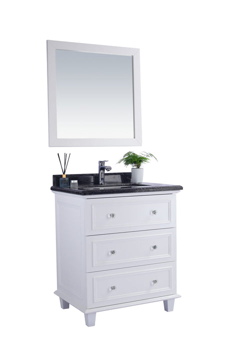 White bathroom vanity with a black marble top and a square mirror.