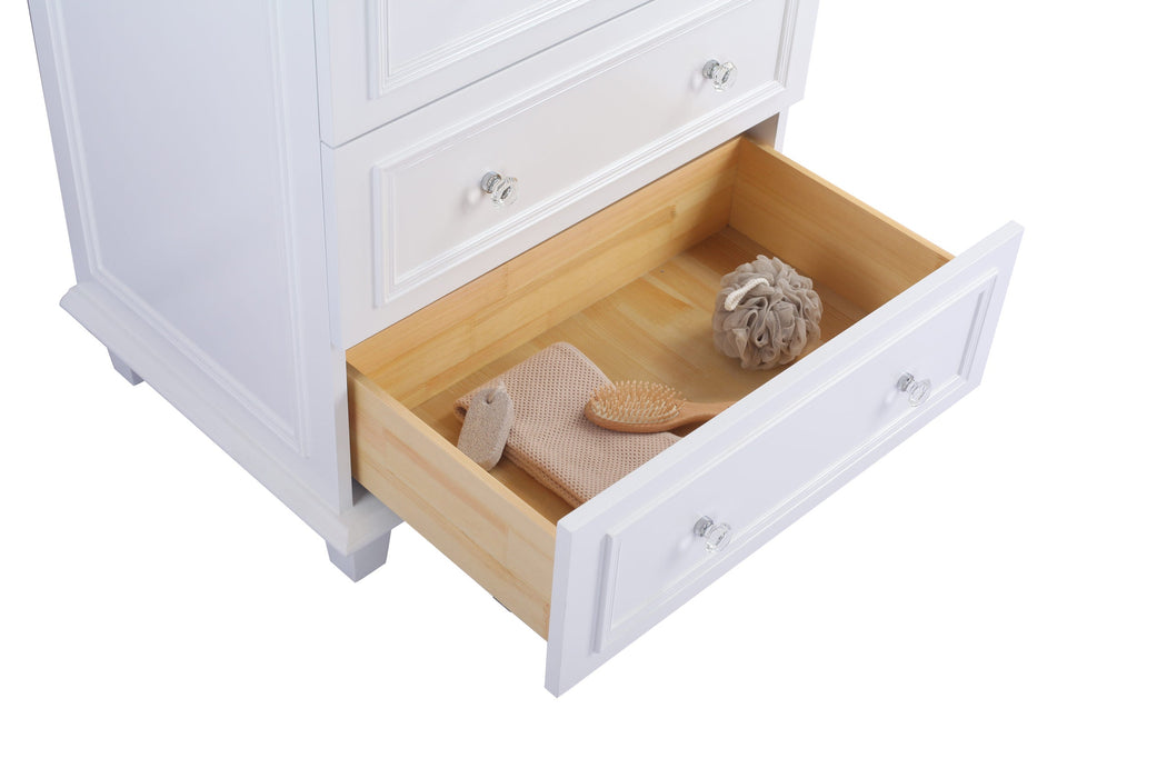 White dresser with open drawer.
