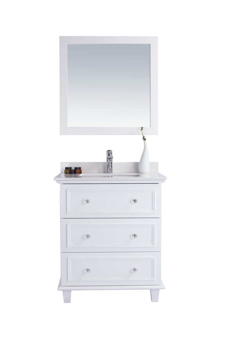 White bathroom vanity with mirror.