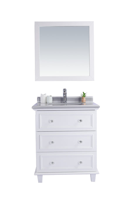 White bathroom vanity with mirror and drawers.