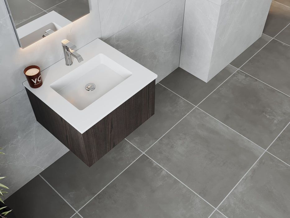 Modern bathroom vanity with gray tile floor and walls.