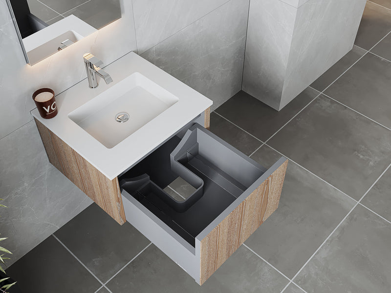 Bathroom vanity with open drawer, sink, and faucet.
