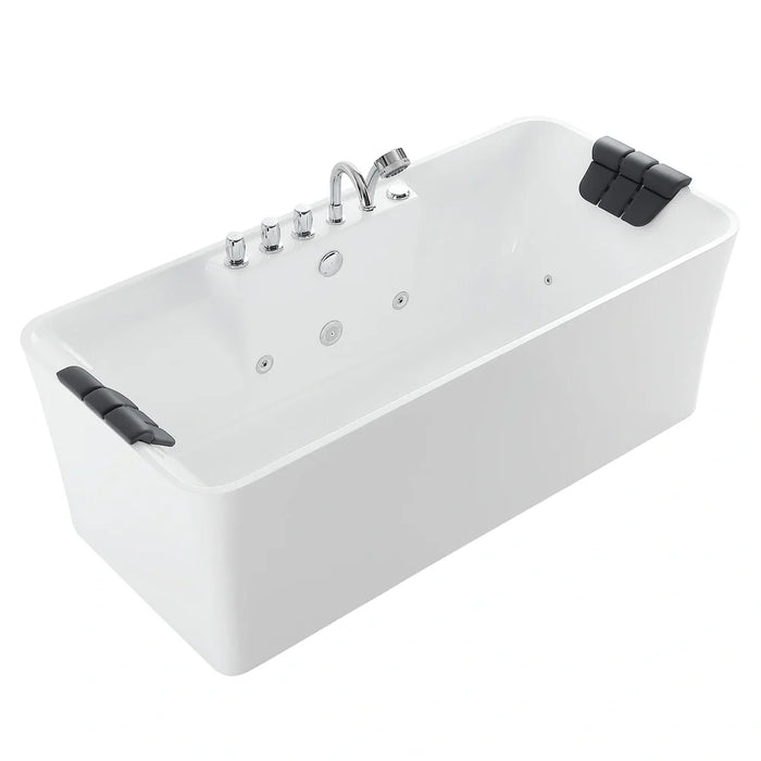 White rectangular whirlpool bathtub with chrome faucet fixtures and black cushioned headrests on each end