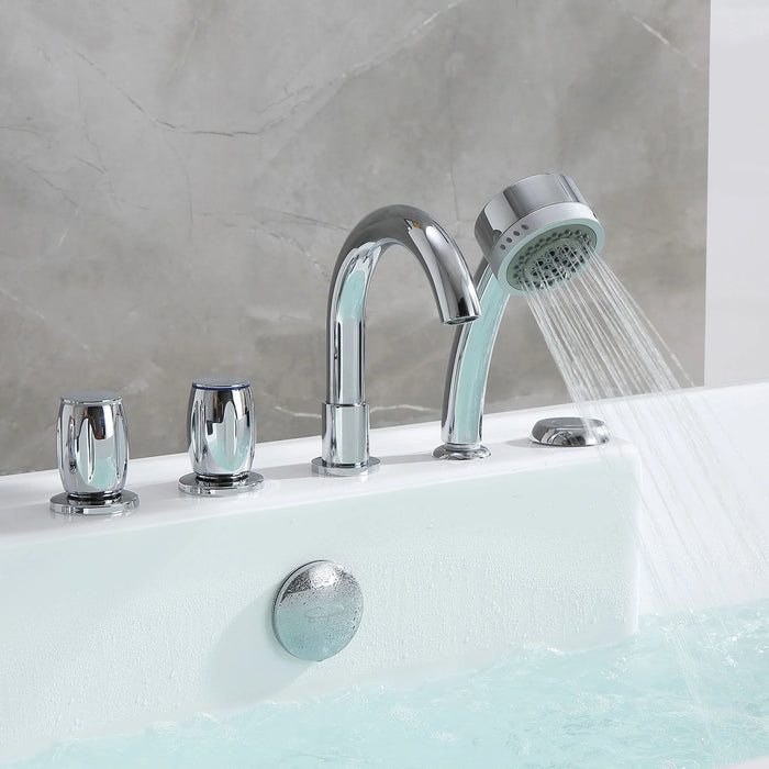Chrome bath faucet and handheld shower head with water flowing, mounted on a white tub against a gray marble wall.