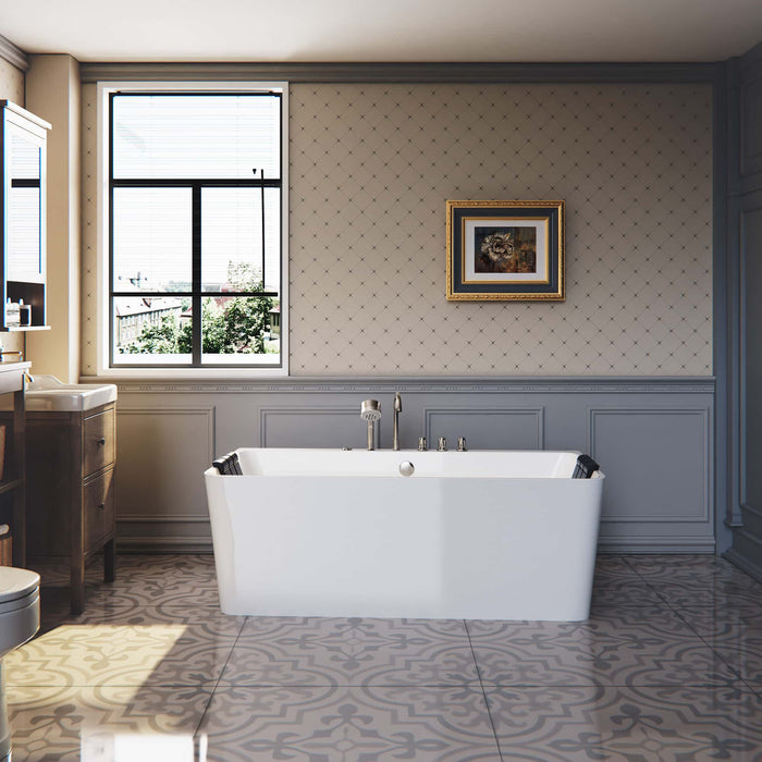 Elegant bathroom with freestanding white bathtub, ornate patterned floor tiles, and large window overlooking greenery