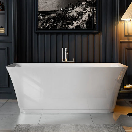Modern white freestanding bathtub in elegant dark-paneled bathroom with black and white cityscape artwork and warm accent lighting.