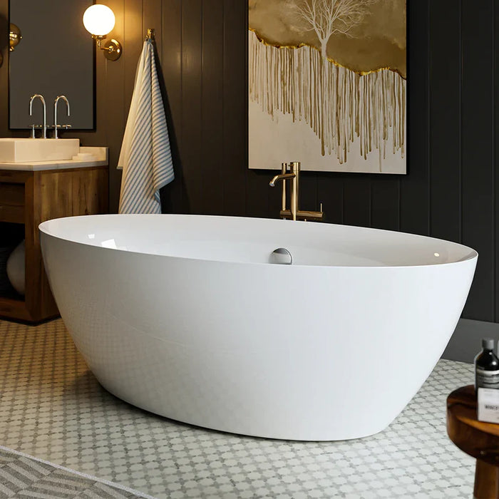 Modern white freestanding bathtub in elegant bathroom with dark walls, gold-toned wall art, and decorative mosaic floor tiles.