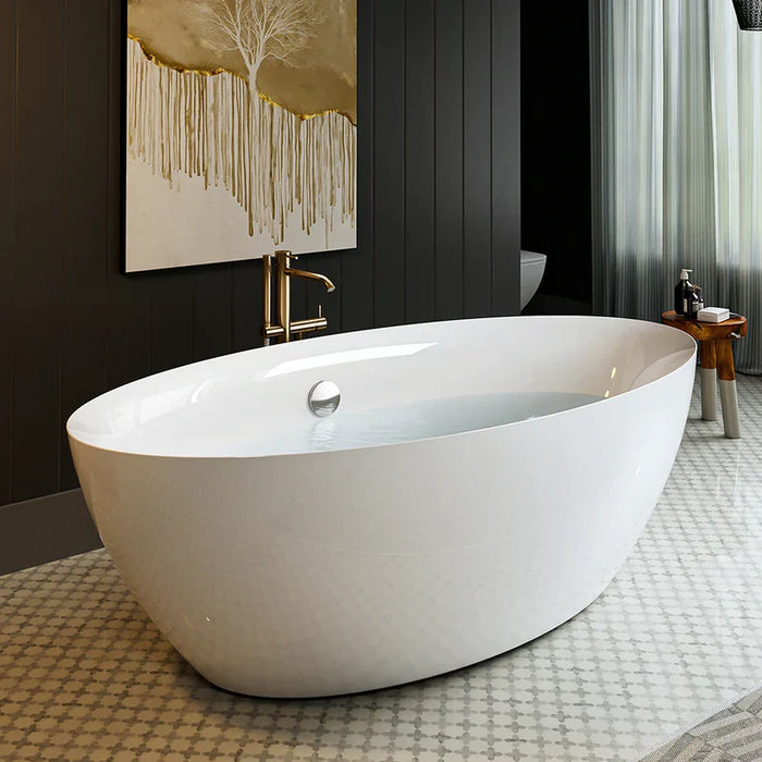 Modern white freestanding bathtub with gold-tinted drip art on dark wall, elegant mosaic floor tiles visible.