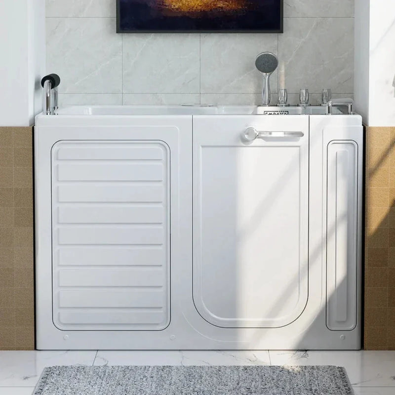 White walk-in bathtub with side door, mounted on beige and white tiled wall with shower fixtures above.