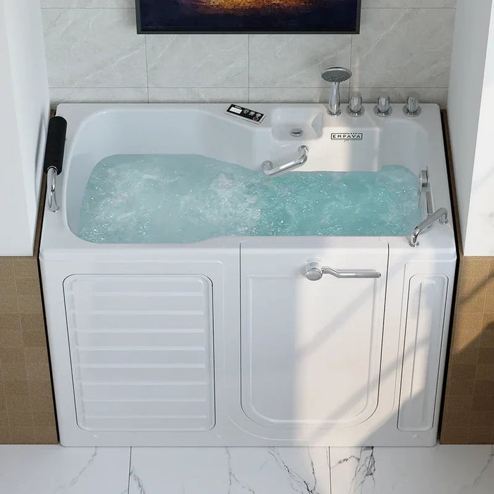 Walk-in bathtub with open door, filled with bubbling blue-green water and multiple chrome fixtures, designed for accessibility.