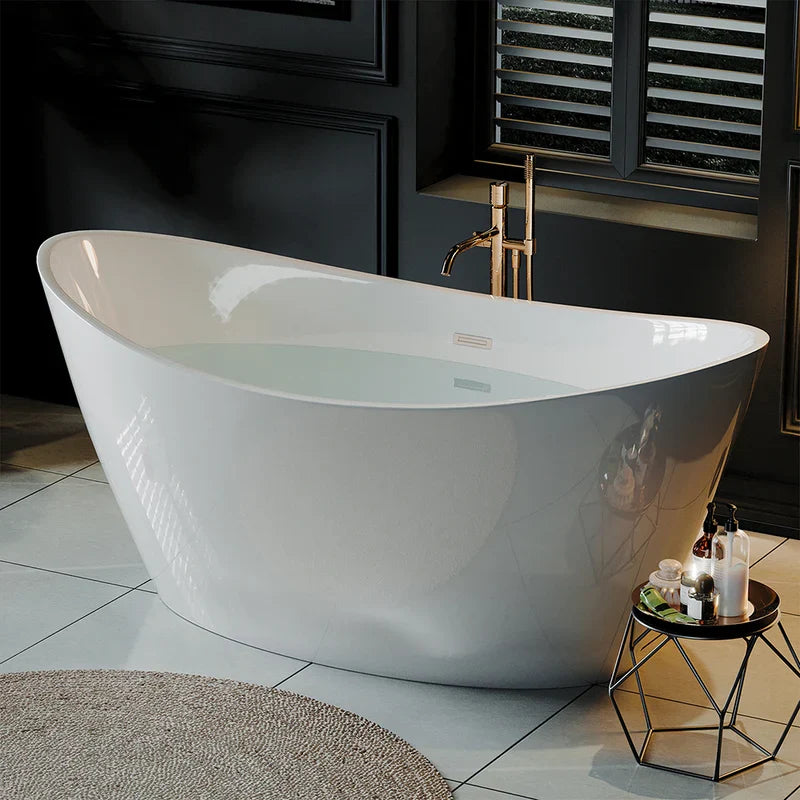 Modern white freestanding bathtub with golden faucet, positioned on tiled floor near dark paneled wall and shuttered window.
