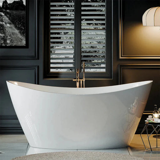 Modern white freestanding bathtub with curved sides, positioned near dark shuttered window and warm ambient lighting.