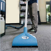 Man Using the EDIC USA TR1 9501FS A Triton Wand on Carpet.