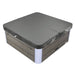 Hot tub with gray hard cover, wood-paneled exterior and white corner accents, closed and ready for use.