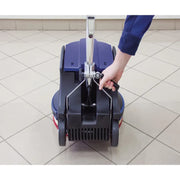 Powr-Flite Millennium Edition 20 Inch Floor Machine adjust handle closeup with user.