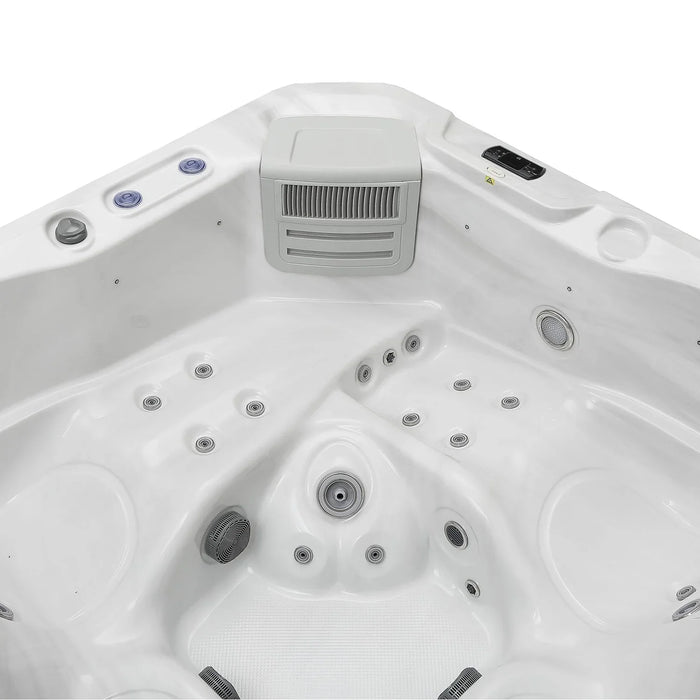 White hot tub with multiple circular jets and a gray ventilation unit in the center, viewed from above.