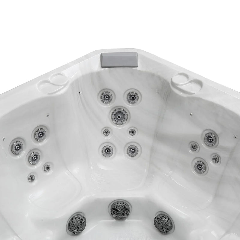 White hot tub interior with multiple gray circular jets positioned symmetrically across curved surface.