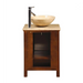 Bathroom vanity with wooden cabinet, stone vessel sink, and modern chrome faucet on travertine countertop