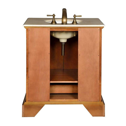 Wooden bathroom vanity with marble top, white sink, and bronze faucet fixtures, featuring open cabinet storage beneath.