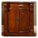 Rich mahogany cabinet with ornate carved columns, decorative marble top, and double doors with elegant metal handles.