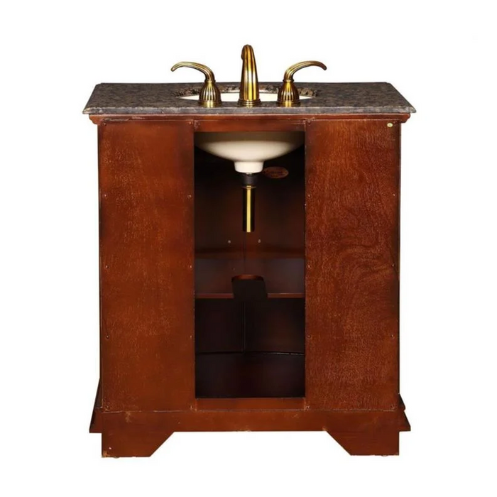 Traditional wood bathroom vanity with marble top and gold-toned faucet, featuring open cabinet storage and white ceramic sink.