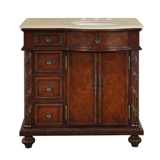 Rich mahogany bathroom vanity with ornate carved details, marble top, oval sink, and four side drawers.