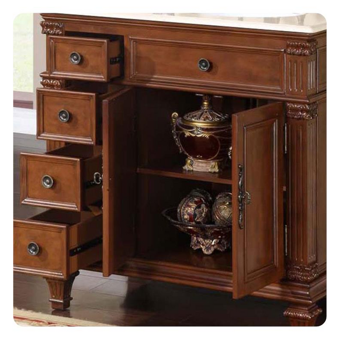 Ornate wooden chest with multiple drawers and an open cabinet, displaying decorative golden urns and intricate carved details.