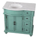 Mint green bathroom vanity with white marble top, two cabinet doors, and four decorative drawers with black knobs.
