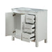 White bathroom vanity with marble top, open cabinet door and three pull-out drawers with metal handles.