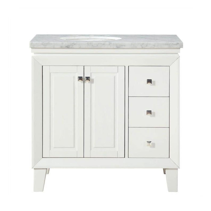 White bathroom vanity with marble countertop, two cabinet doors, and three side drawers with silver hardware.