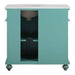 Teal bathroom vanity with white countertop, decorative turned legs, and interior shelf storage.