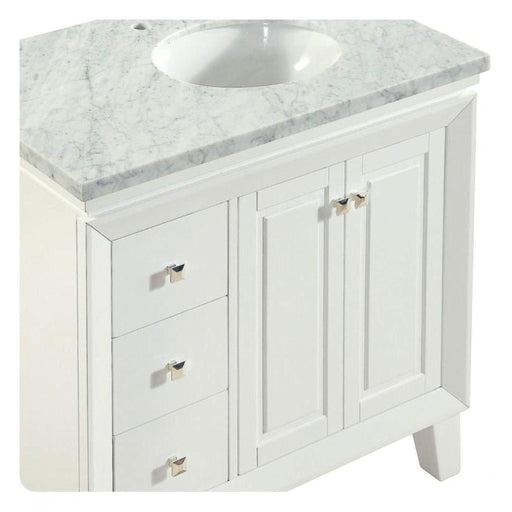 White bathroom vanity with marble countertop, featuring side drawers, cabinet doors, and an oval undermount sink.