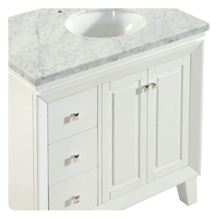 White bathroom vanity with marble countertop, featuring side drawers, cabinet doors, and an oval undermount sink.