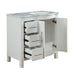 White bathroom vanity with marble top, three drawers pulled out, and an open cabinet door, showcasing storage options.