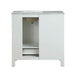 White bathroom vanity with marble top, one open compartment, and two drawers on short legs.