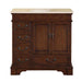 Dark wood bathroom vanity with marble top, four drawers on left, center cabinet doors, ornate metal handles