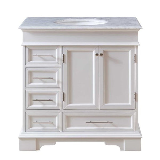 White bathroom vanity with marble top, four drawers, and two cabinet doors with oval undermount sink.