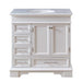 White bathroom vanity with marble top, four drawers, and two cabinet doors with oval undermount sink.