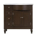 Dark wood bathroom vanity with white marble top, four drawers on left, double cabinet doors on right, and turned legs