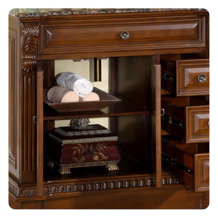 Ornate wooden furniture shelf with rolled towels, decorative box, and carved details, showcasing elegant storage design.
