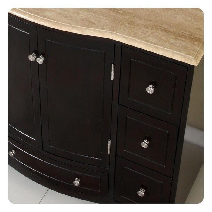 Dark wooden bathroom vanity with curved design, marble top, and silver round drawer pulls, featuring one cabinet door and three drawers.